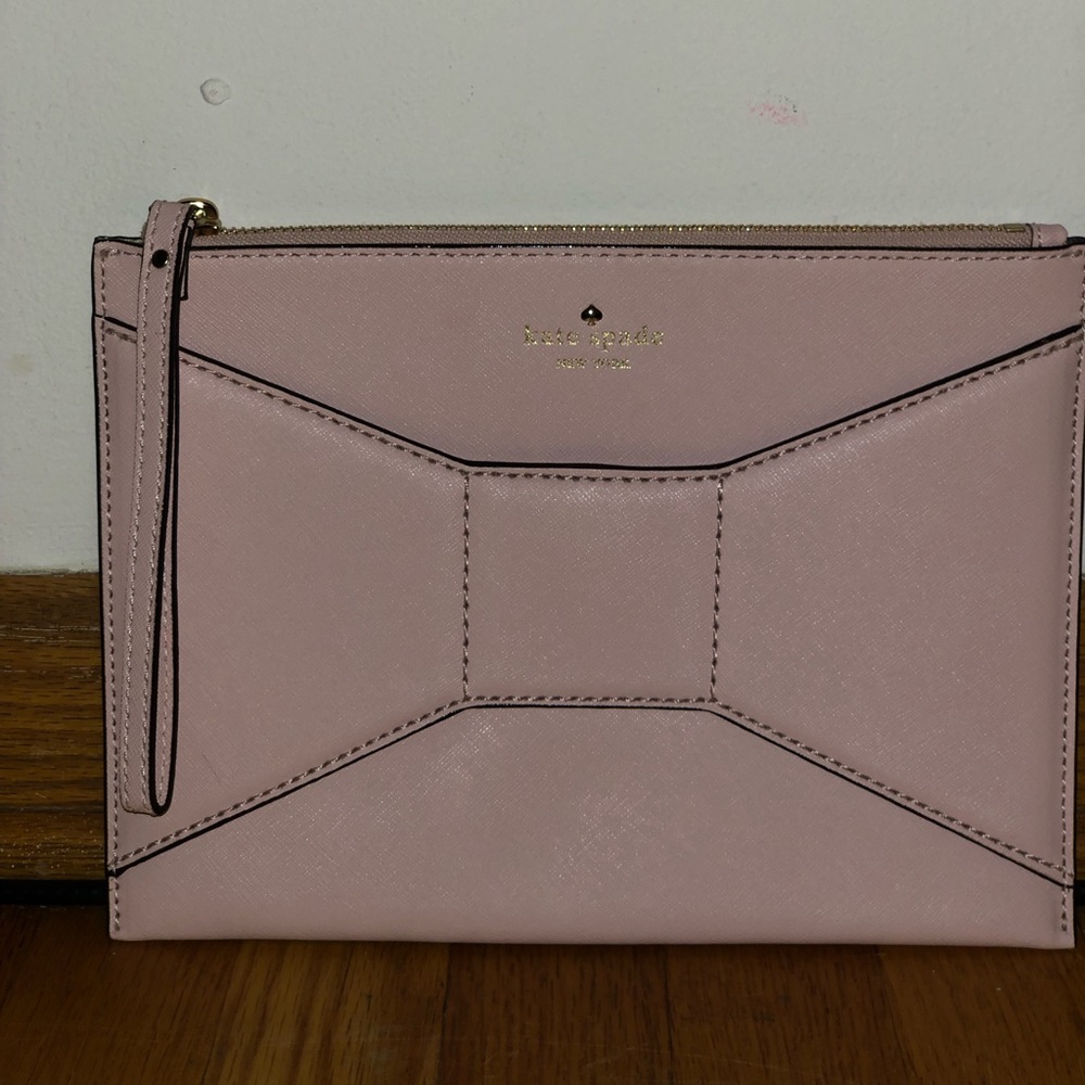 Authentic New Kate Spade clutch.